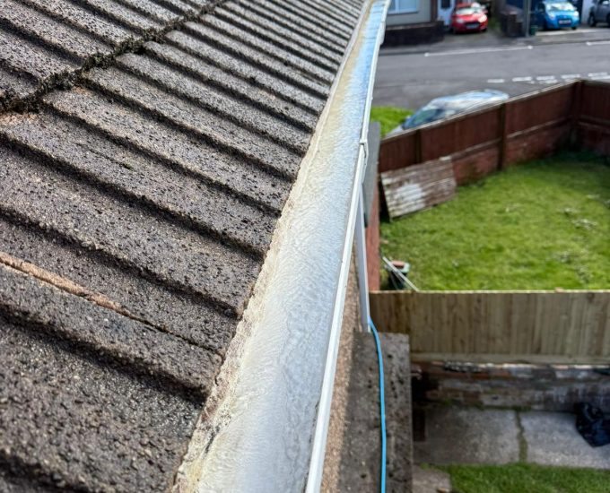The spotless fascia boards after gutter cleaning in South Wales